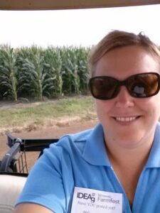 Beth in front of corn field