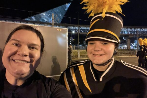 Heidi with Hanna at marching band event