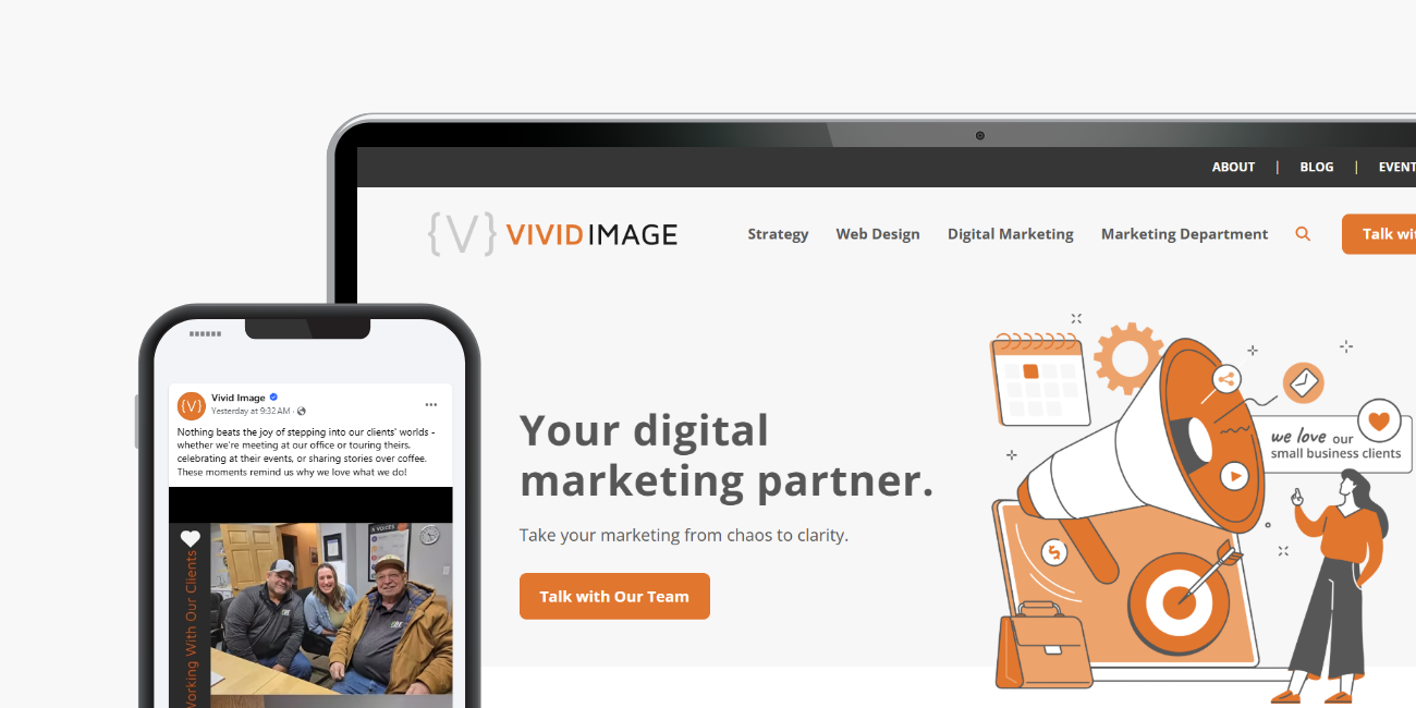 A smartphone and a laptop display the Vivid Image website, featuring digital marketing services, a large megaphone graphic, and the text Your digital marketing partner.