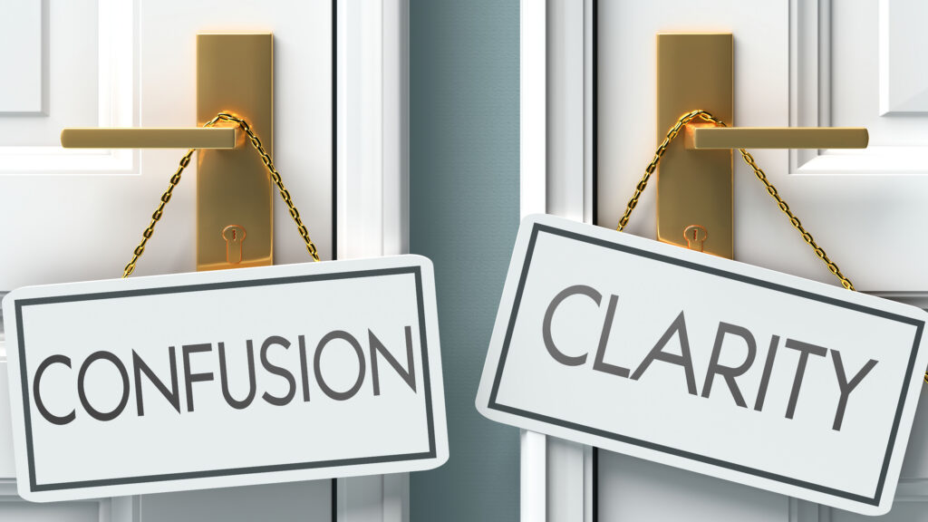 Two doors with gold handles; one has a sign reading CONFUSION, the other CLARITY. The signs hang from each handle, representing a choice between confusion and clarity.